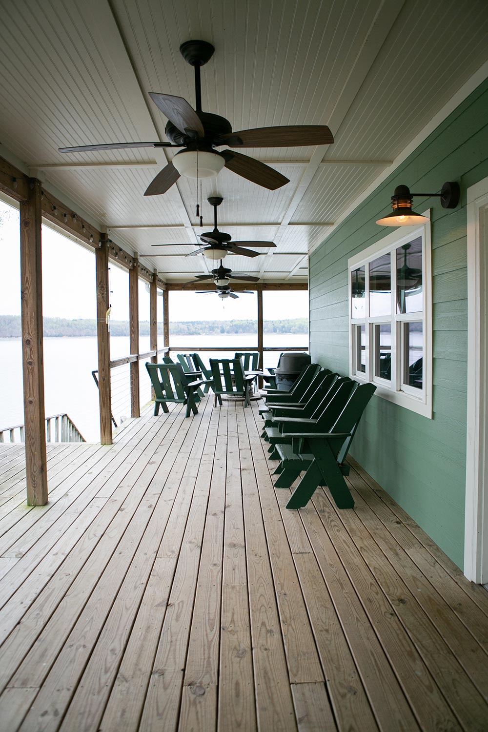 Outdoor ceiling fan installed on a covered porch