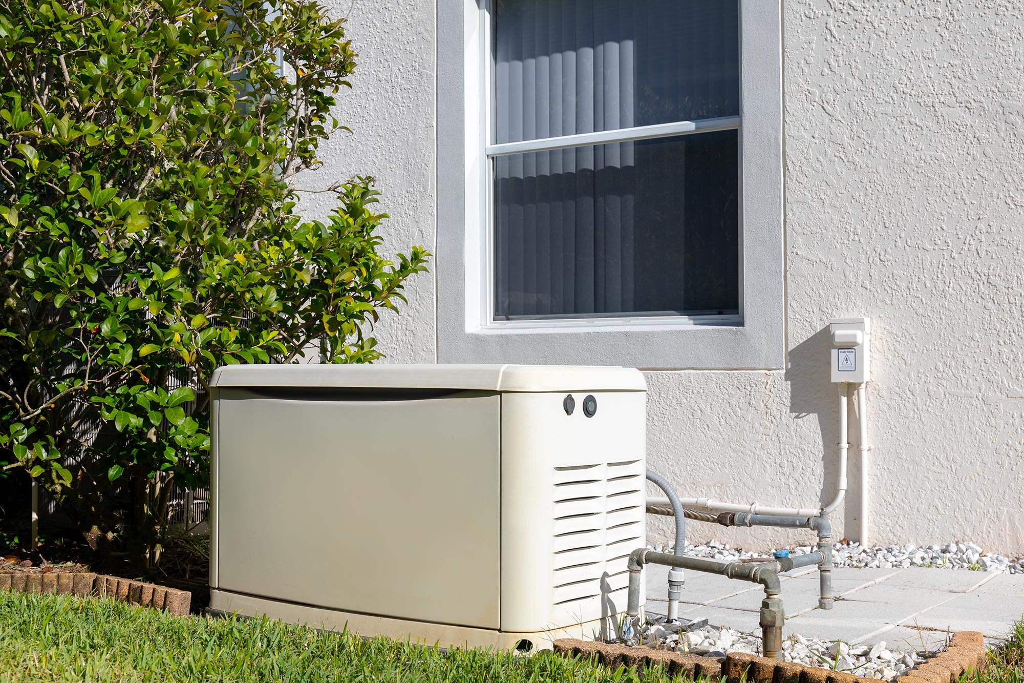 Residential backup generator on a prepared pad