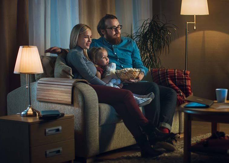 Family relaxing safely at home