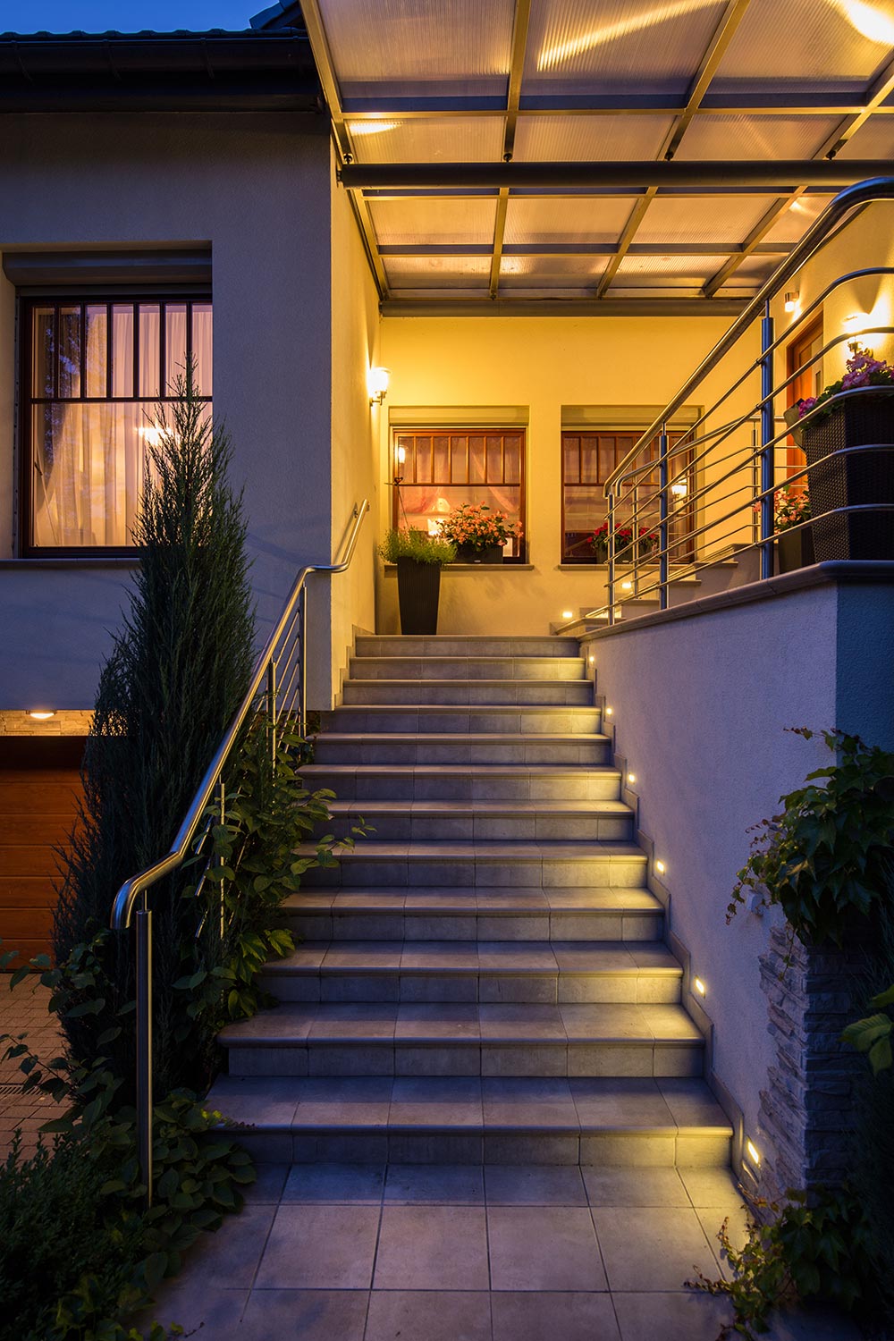 Landscape lighting illuminating a home exterior