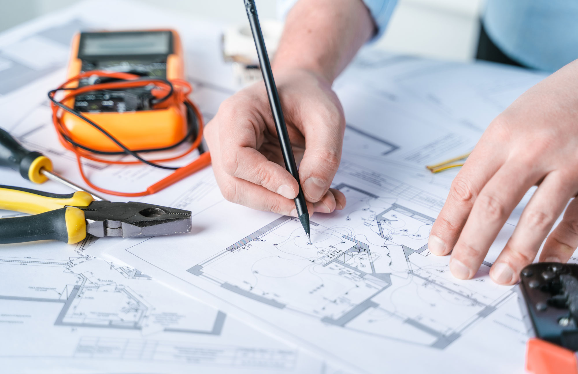 Electrician reviewing electrical plans